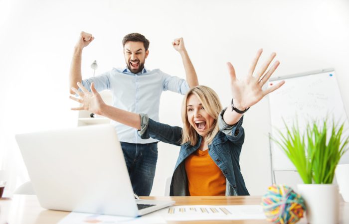 Cheerful,Young,Office,Workers,Are,Expressing,Happiness