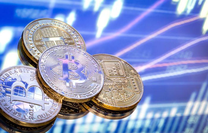 Bitcoin is a new concept of virtual money, the graphics and digital background. Coins with the image of the letter B. a Conceptual image of the world of digital cryptocurrency and payment system